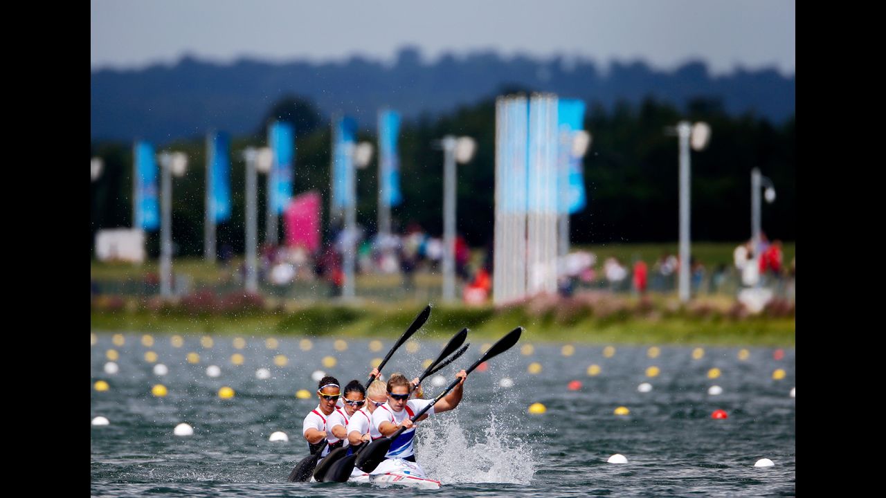 The Great Britain team races downriver in the women's kayak four 500-meter sprint semifinal in Windsor.