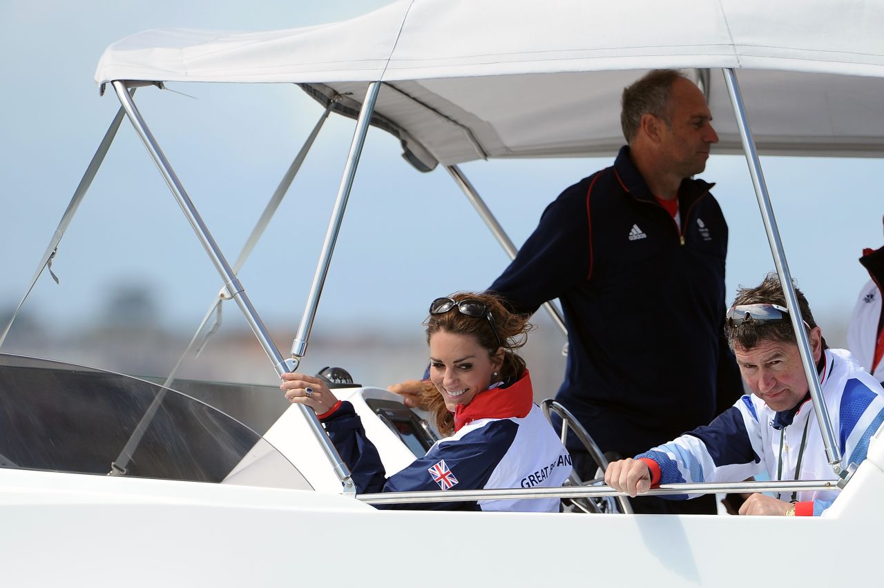 Catherine, Duchess of Cambridge, and Sir Timothy Laurence attend the women's laser radials race at the Weymouth & Portland Venue at Weymouth Harbour.