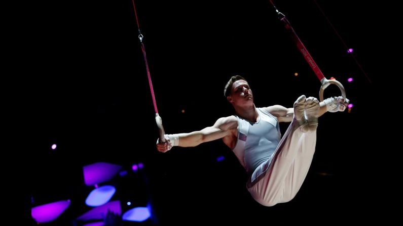 A gymnast performs a demonstration on the rings before the gymnastics events on Monday, day 10 of the London 2012 Olympic Games.