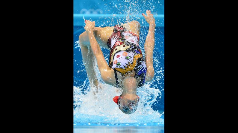 Russia's Svetlana Romashina competes in the duets free routine preliminary round during the synchronized swimming competition.