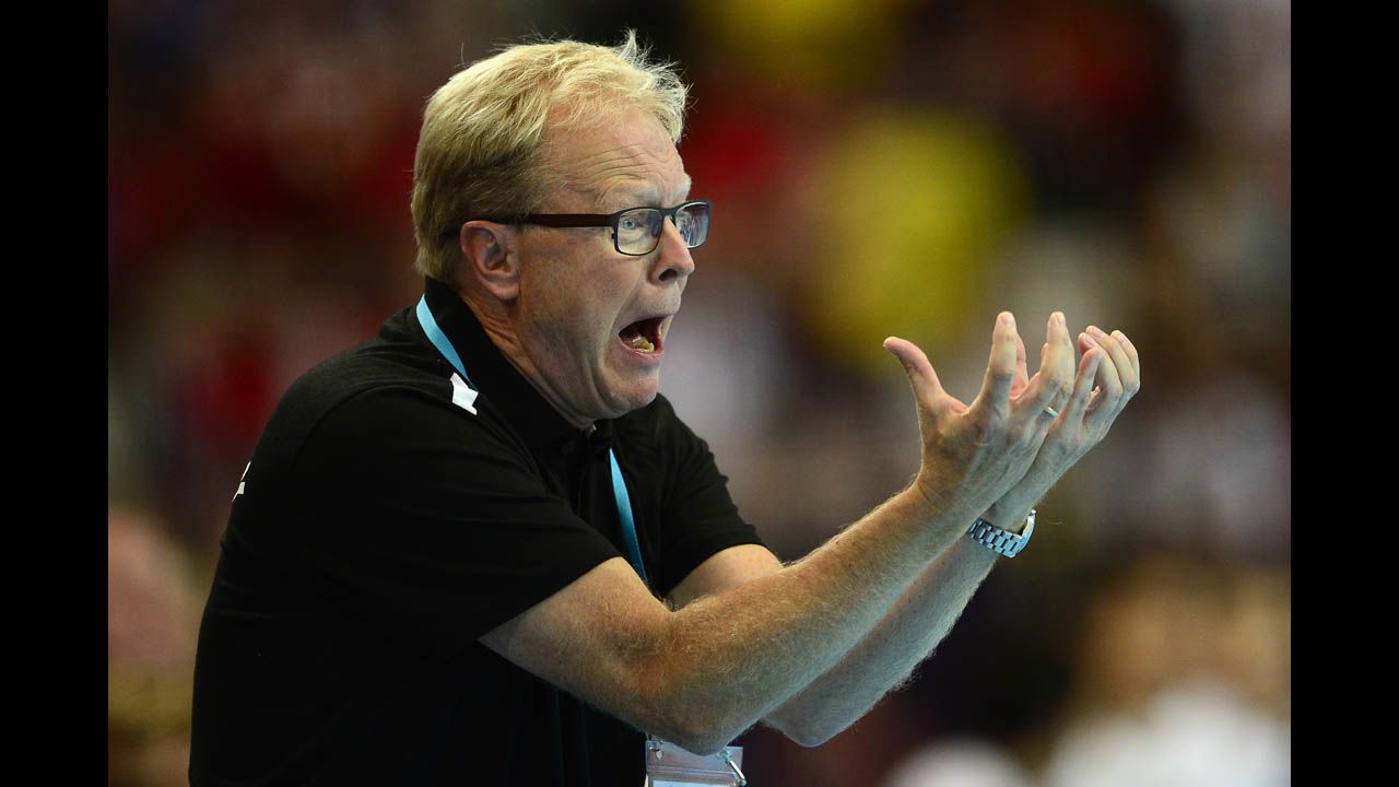 Denmark coach Ulrik Wilbek reacts during the men's preliminary Group B handball match against South Korea.