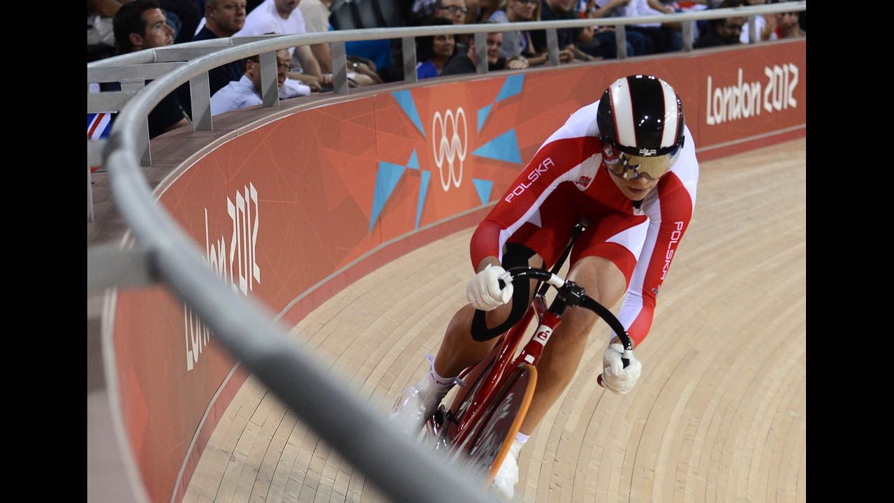 Poland's Malgorzata Wojtyra competes during the women's omnium flying lap 250-meter time trial cycling event.