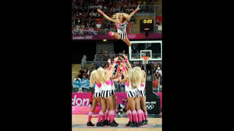 The Red Foxes dance team performs during a timeout in the Great Britain-China men's basketball preliminary game
