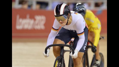 Germany's Kristina Vogel, front, and Lithuania's Simona Krupeckaite compete during the women's cycling sprint quarterfinal.