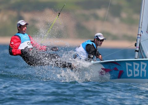 Luke Patience, left, and Stuart Bithell of Great Britain compete in the men's 470 sailing event in Weymouth, England.