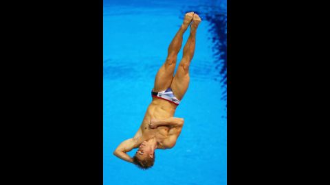 Jack Laugher of Great Britain competes in the men's 3-meter springboard diving preliminary.