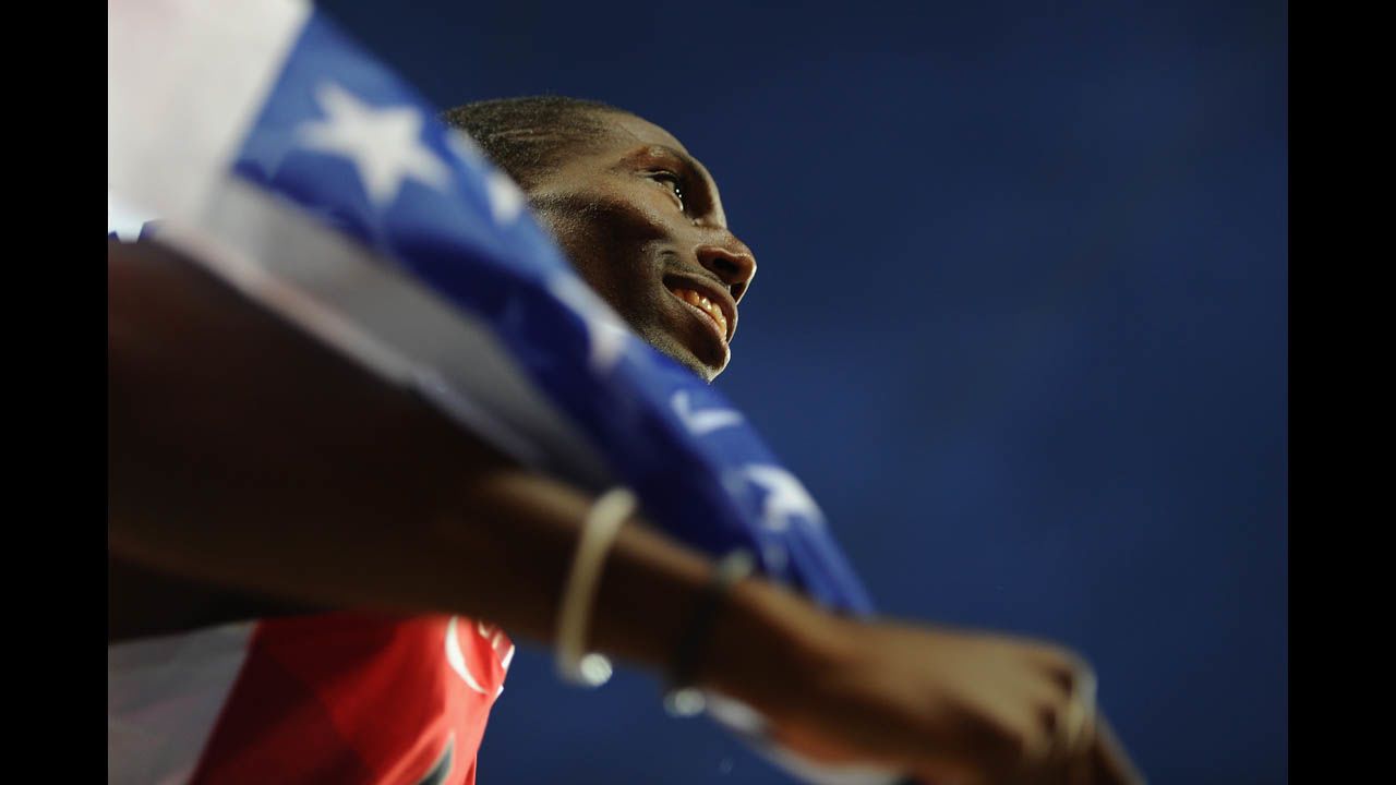 Michael Tinsley of the United States celebrates after winning the silver medal in the men's 400-meter hurdles final.