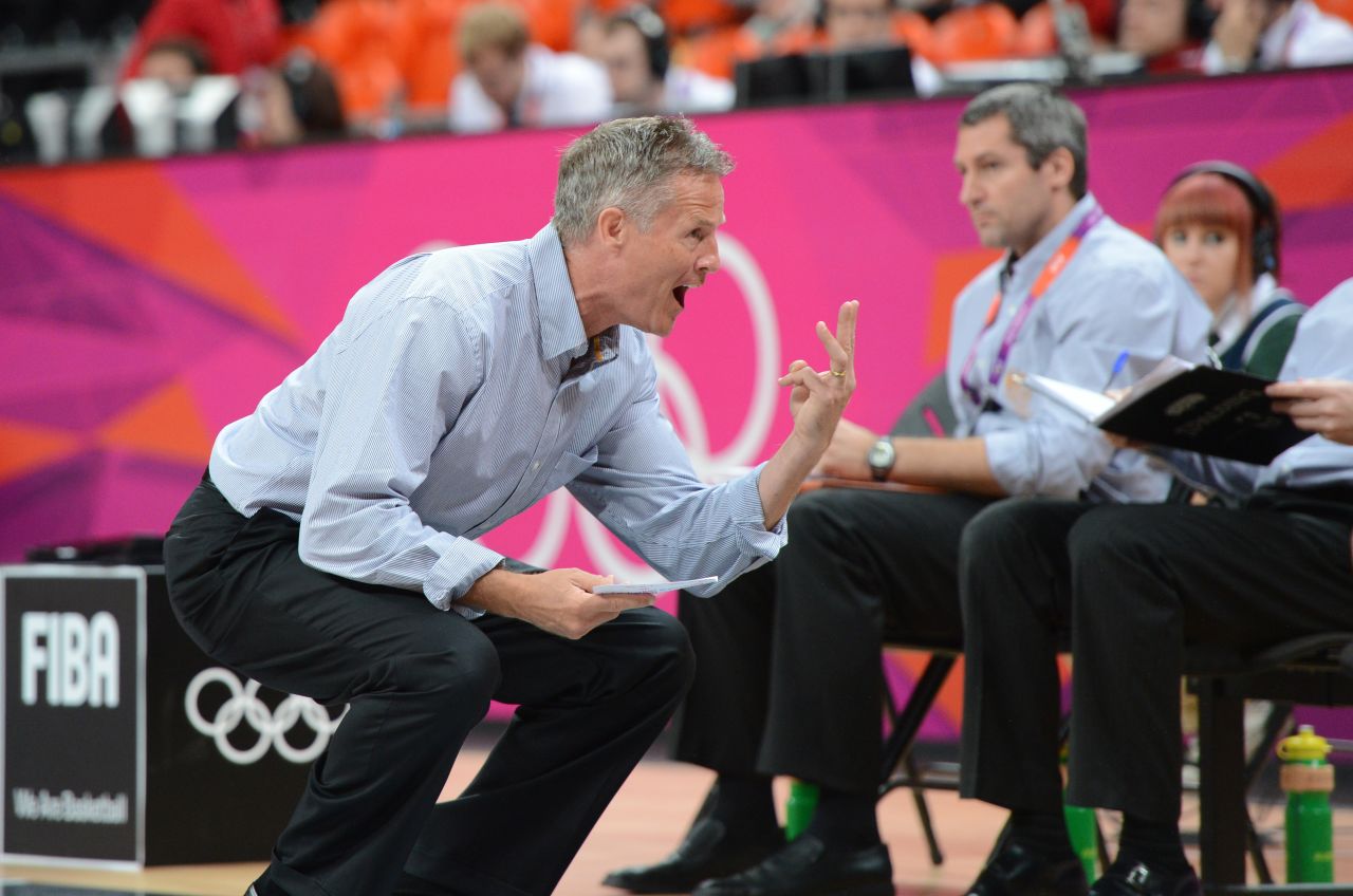 Australian coach Brett Brown shouts instructions to his players during the game against Russia.