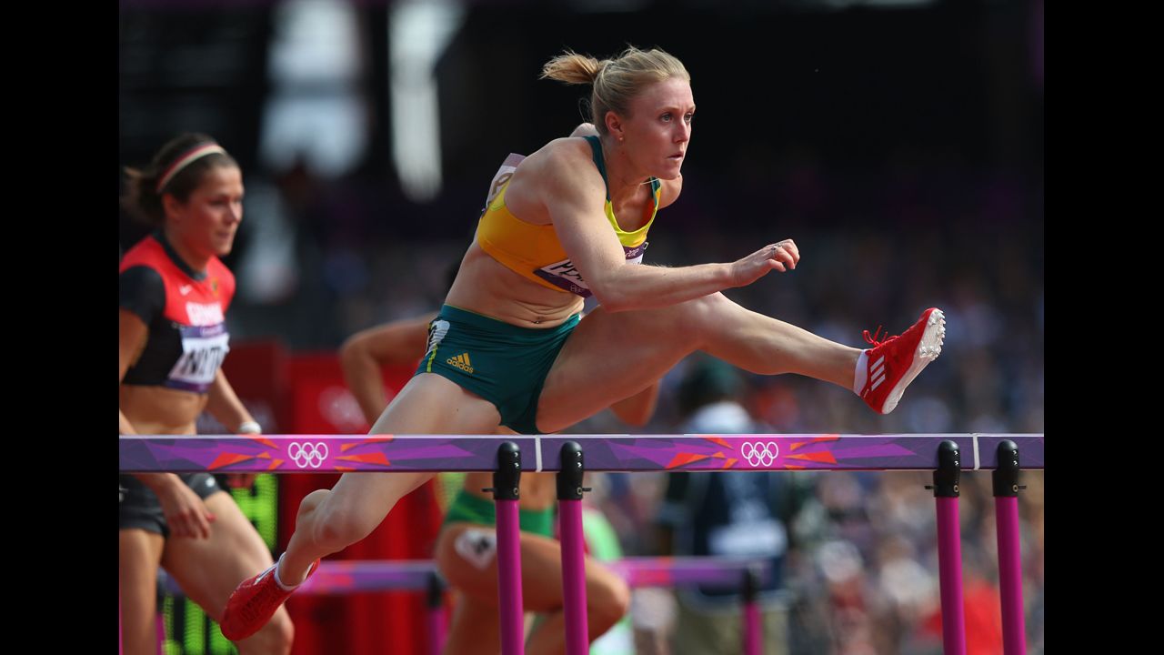 Sally Pearson of Australia competes in the women's 100-meter hurdles heat.