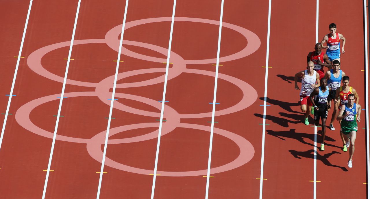 Athletes race in the men's 800-meter heat Monday.