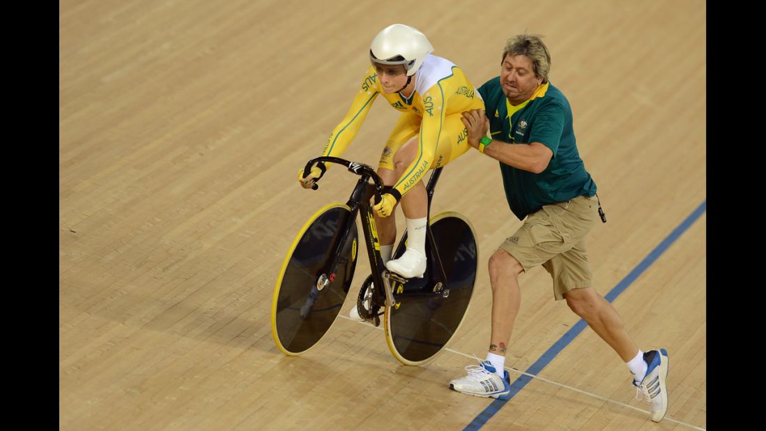 Training wheels removed, Australia's Annette Edmondson rides a bike for the first time.