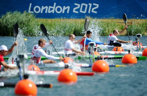 Athletes compete in the men's kayak single (K1) 1,000-meter canoe sprint semifinal event.