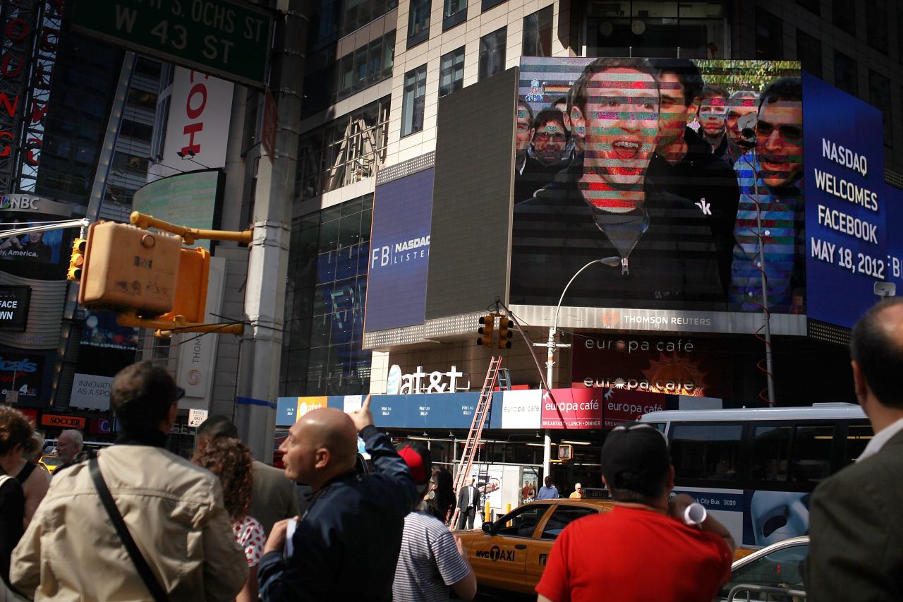 Facebook's May debut as a public company was one of 2012's biggest blunders. Expectations for the company's stock were huge, but by September it was trading at less than half its initial price. Here, founder Mark Zuckerberg is shown on a screen in Times Square after ringing the opening Nasdaq bell on May 18.