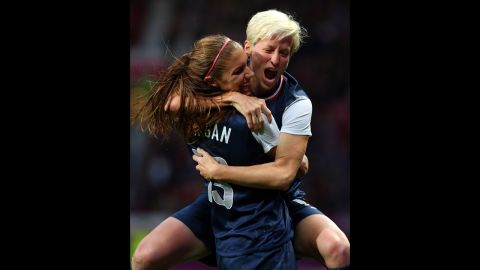 Alex Morgan, left, celebrates with Megan Rapinoe after scoring the winning goal against Canada in the women's soccer semifinal.