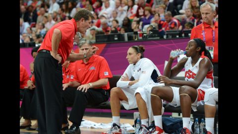 U.S. coach Geno Auriemma talks to his players during the women's quarterfinal basketball game against Canada. U.S. defeated Canada 91-48.