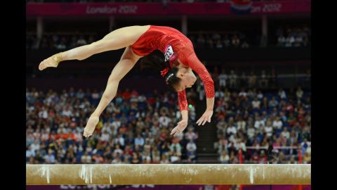 Chinese gymnast Sui Lu performs on the balance beam during the women's gymnastics event.