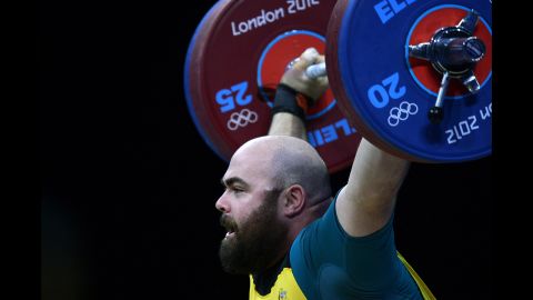 Australia's Damon Kelly competes during the men's +105-kilogram Group B weightlifting event.