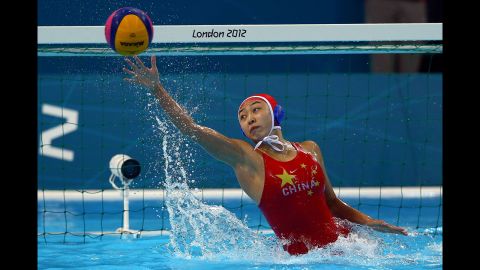 Goalkeeper Jun Yang of China makes a save against Italy during the women's water polo semifinal match.