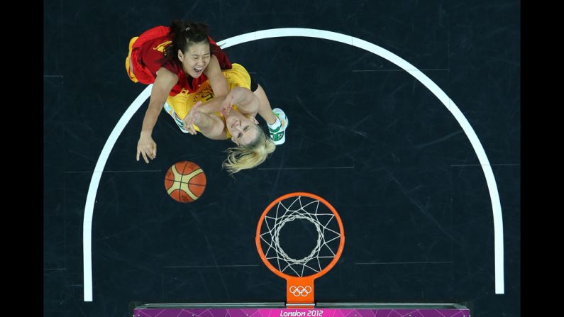 Song Gao, No.12 of China, shoots over Lauren Jackson, No. 15 of Australia, during the women's basketball quaterfinal.