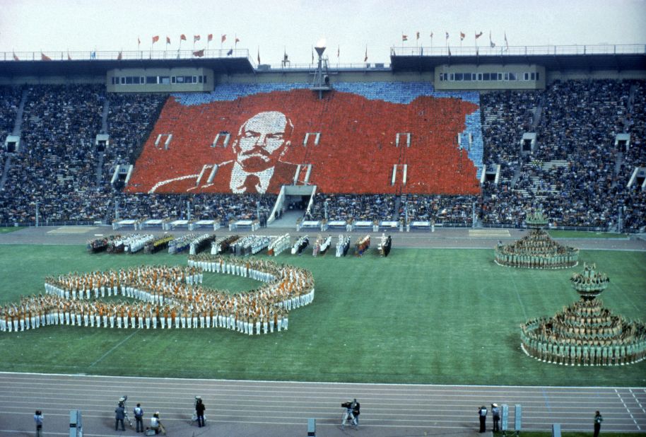 A further 55 countries joined the boycott of the opening ceremony in Moscow. Here a choreographed show from the crowd and performers produce a hammer and sickle and the face of Lenin.