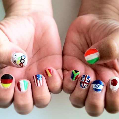 Maria Maslin painted her mother's nails to <a href="http://ireport.cnn.com/docs/DOC-825520">reflect several of the countries</a> competing in the Olympics this year. "I tried to be diverse with the countries I picked in order to represent a large span of the world," she explained. From left, the flags represented are Germany, Italy, United States, Spain, South Africa, Great Britain, Israel and Japan. On her thumbs are the Olympic flag and Ireland.