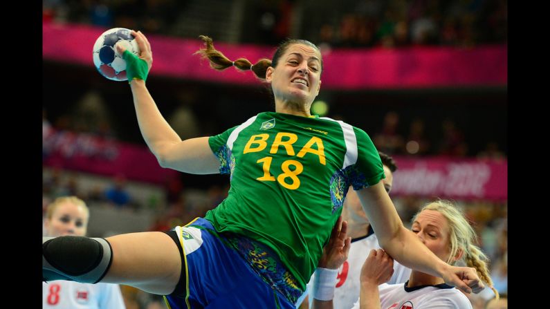 Brazilian left back Eduarda Amorim jumps to shoot during the women's quarter-final handball match against Norway.