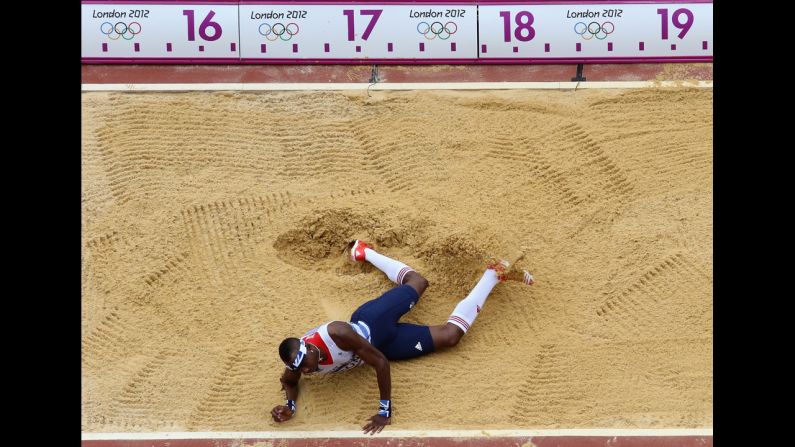 Phillips Idowu of Great Britain competes in the men's triple jump qualification. Check out photos from <a href="index.php?page=&url=http%3A%2F%2Fwww.cnn.com%2F2012%2F08%2F08%2Fworldsport%2Fgallery%2Folympics-day-twelve%2Findex.html" target="_blank">Day 12 of the competition</a> from Wednesday, August 8.