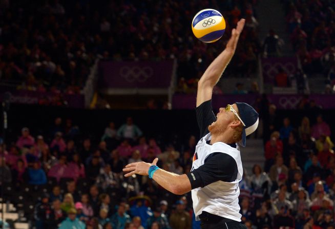 Germany's Jonas Reckermann serves during the men's beach volleyball semifinal against Reinder Nummerdor and Rich Schuil from Netherlands on Tuesday, August 7.  <a href="index.php?page=&url=http%3A%2F%2Fwww.cnn.com%2F2012%2F08%2F06%2Fworldsport%2Fgallery%2Folympics-day-ten%2Findex.html">Check out Day 10 of competition</a> from Monday, August 6. The Games ran through August 12. 