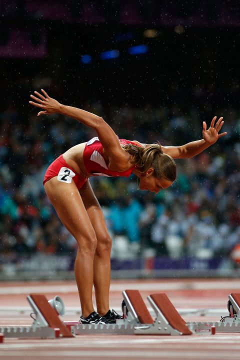 Lolo Jones of the United States competes in the women's 100-meter hurdles semifinals.