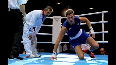 Alexis Vastine of France looks dejected after defeat to Taras Shelestyuk of Ukraine during the men's welter boxing.