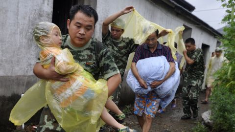 Residents evacuate from their homes in Zhoushan, east China's Zhejiang province as Tropical Storm Haikui approahces.