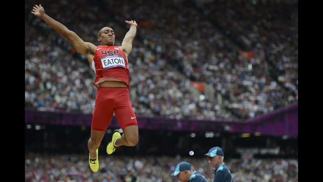 American Ashton Eaton competes in the men's decathlon long jump qualifications.