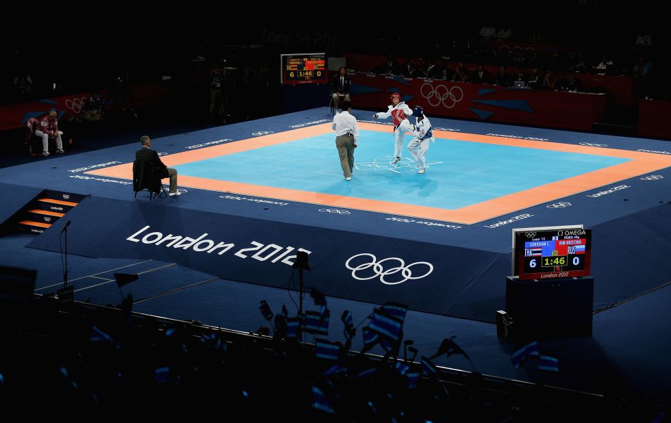 Chanatip Sonkham of Thailand competes against Kristina Kim of Russia during the women's taekwondo under 49-kilogram preliminary match.