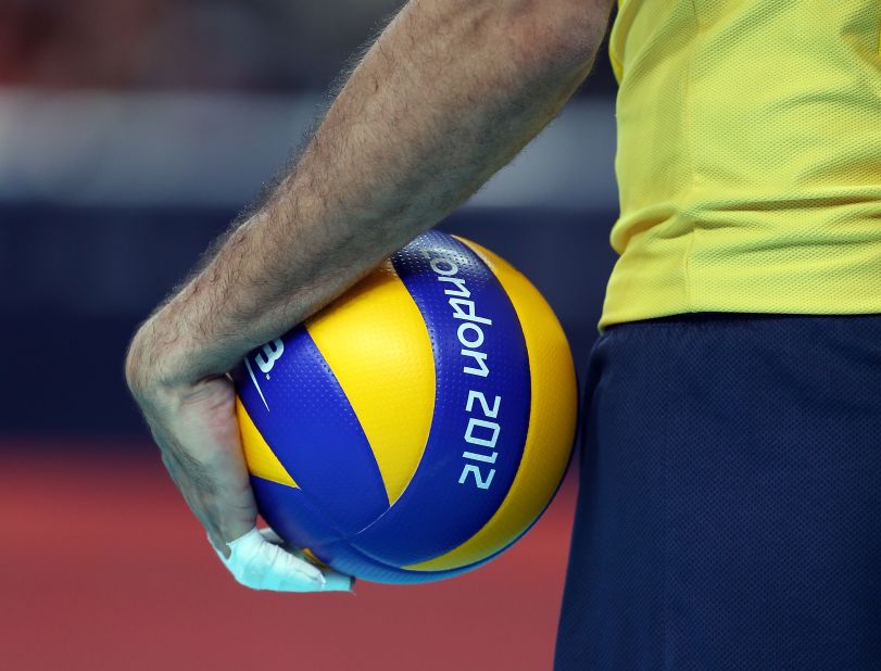 Brazil's Dante Amaral waits to serve the ball against Argentina during the men's volleyball quarterfinals.