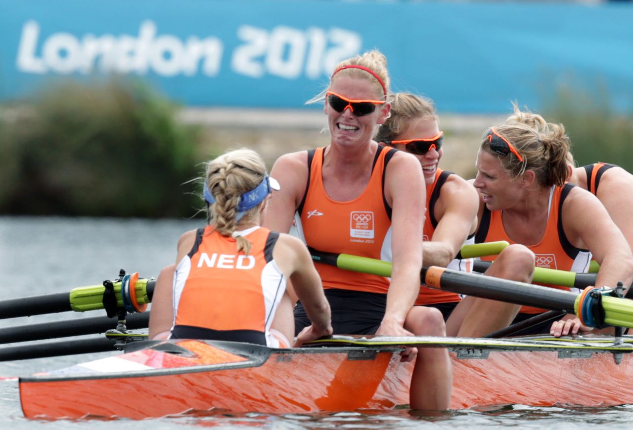 Annemiek de Haan of the Netherlands cries after her crew finished third in the women's eight rowing competition.
