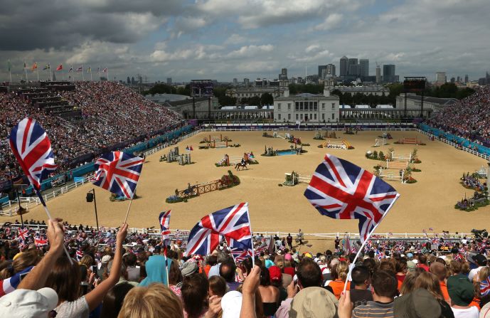 Fans cheer the individual jumping equestrian event on Wednesday.