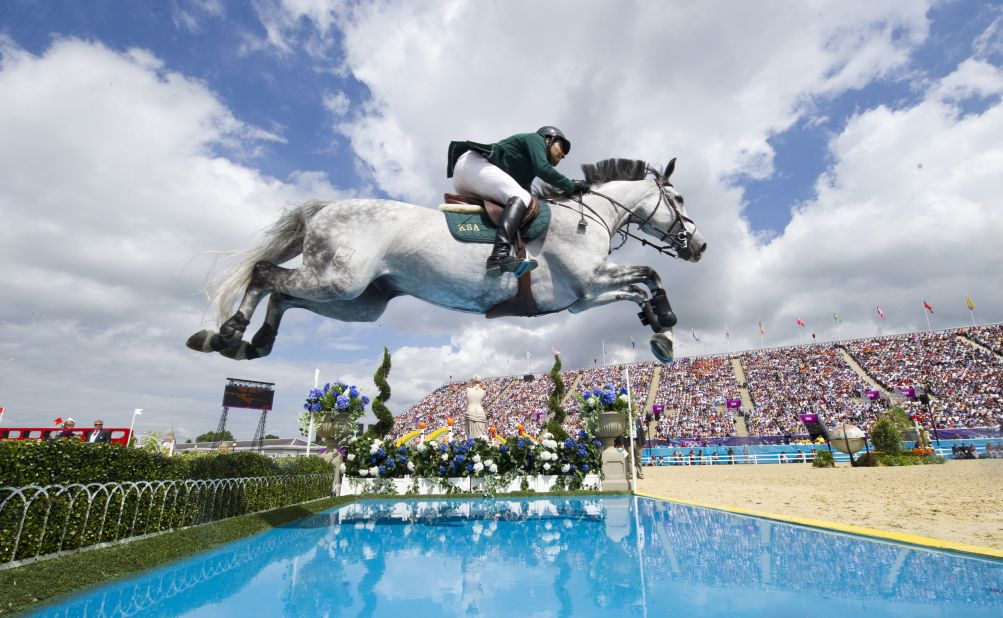 Prince Abdullah Al Saud of Saudi Arabia, on Davos, competes in the individual show jumping final.