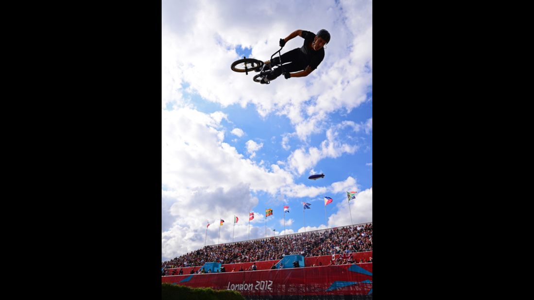 A freestyle BMX rider entertains the crowds during a break in the seeding phase runs.