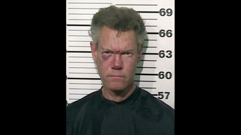Musician Randy Travis was arrested in 2012 for misdemeanor DWI and felony retaliation after he was involved in a one-vehicle accident and found naked in the road. He was later released on bail. 