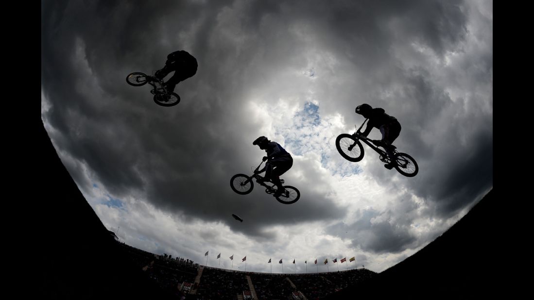 Exhibition riders perform on the BMX track.
