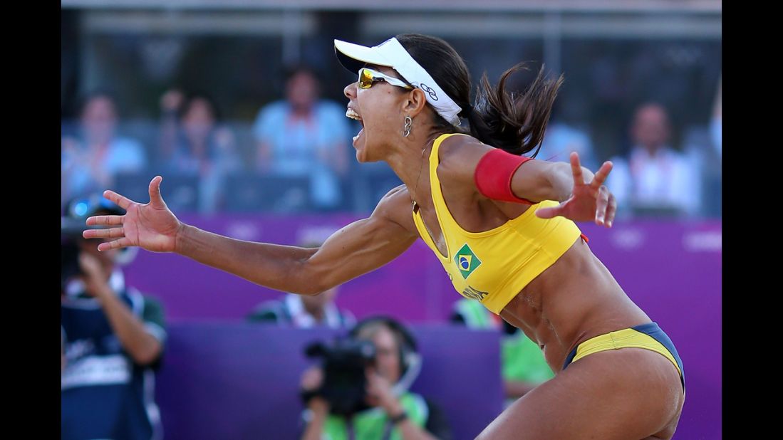 Brazilian beach volleyball player Juliana Silva celebrates during the match against China. Brazil won the bronze medal.