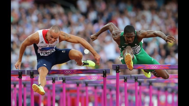 British hurdler Andrew Turner and Nigeria's Selim Nurudeen compete in the men's 110-meter hurdles semifinal.