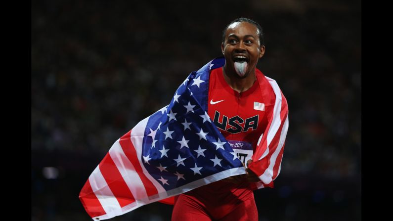 Aries Merritt of the United States celebrates after winning gold in the men's 110-meter hurdles final.