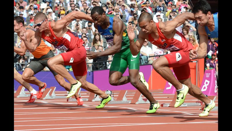 From left, Trey Hardee of the United States, Luiz Alberto de Araujo of Brazil and Ashton Eaton of the United States compete in the men's decathlon 100-meter heats.