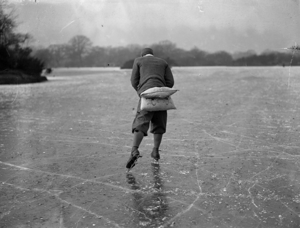 A skater takes to the ice -- a cushion providing protection against a fall -- at Hollow Ponds, Leytonstone, in December 1927 during one of the worst winters to hit 20th century London. The Ponds stand on the southern edges of <a href="http://www.cityoflondon.gov.uk/things-to-do/green-spaces/epping-forest/Pages/default.aspx" target="_blank" target="_blank">Epping Forest</a>, a centuries-old protected area of woodland frequented by figures as diverse as Henry VIII, highwayman Dick Turpin and Charles Dickens  (Getty Images).