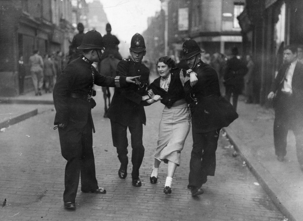 A female demonstrator is arrested by police amid clashes between fascists and communists in October 1936 during the Battle of Cable Street. Trouble erupted as the extreme-right Blackshirts -- led by Sir Oswald Mosley -- attempted to march through the heart of the biggest Jewish community in the UK. Tens of thousands of residents defending their neighborhoods clashed with police who were attempting to secure the route for the fascist marchers. The <a href="http://www.youtube.com/watch?v=-AQDOjQGZuA" target="_blank" target="_blank">Blackshirts were eventually beaten back</a> in a defining moment in East End history (Getty Images).