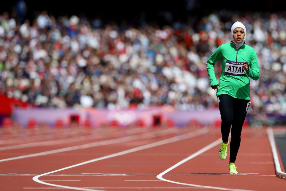 Sarah Attar of Saudi Arabia competes in round one of the women's 800-meter heats at Olympic Stadium.