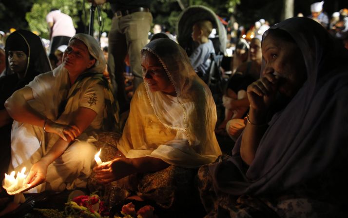 Mourners continue to hold vigils such as the one Tuesday at the Oak Creek Community Center after the carnage left the local Sikh community reeling.