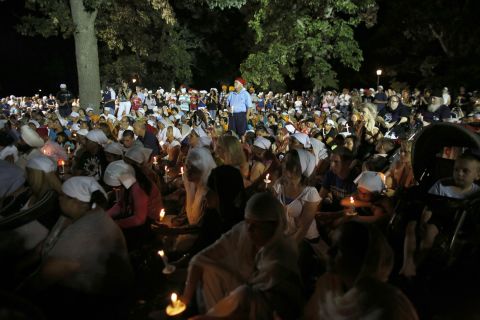 Mourners and supporters of the Sikh Temple of Wisconsin attend the vigil at the Oak Creek Community Center on Tuesday night.