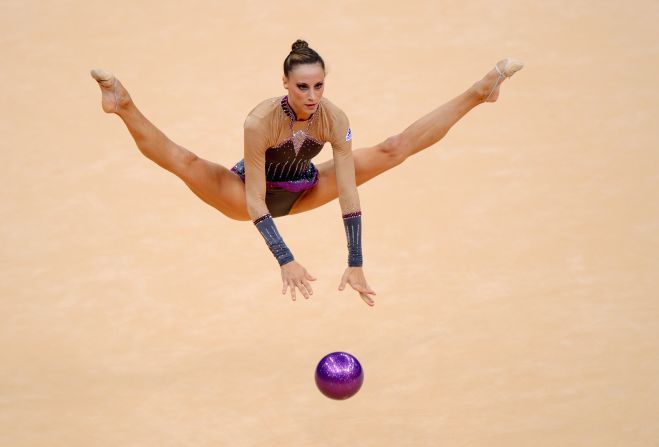 France's Delphine Ledoux competes in the individual all-around rhythmic gymnastics.